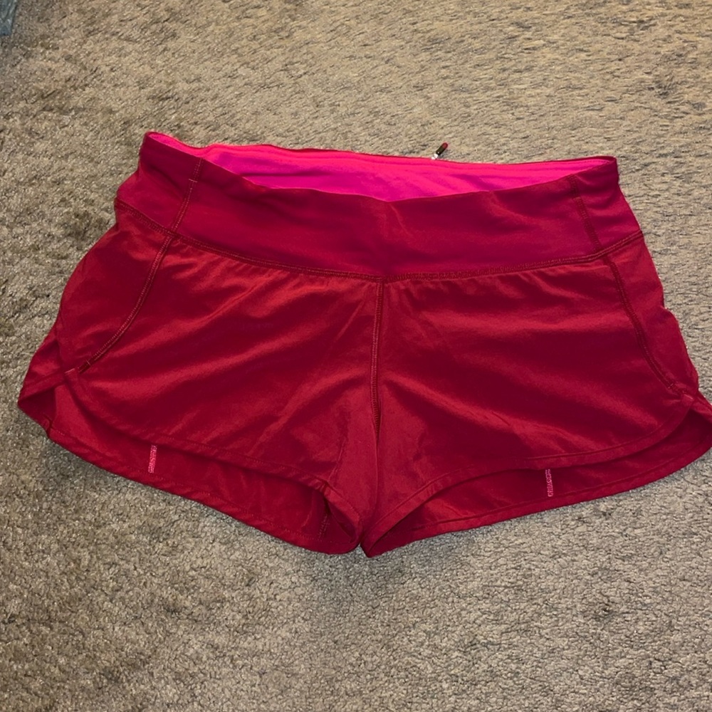 Lululemon red speed up shorts, size 6